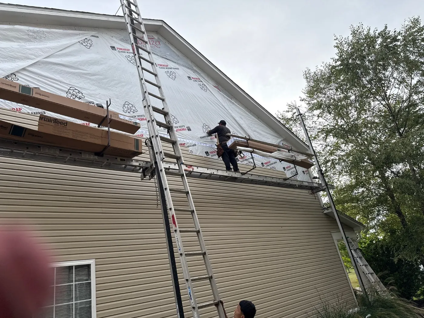 Storm-damaged siding documented in Fortville